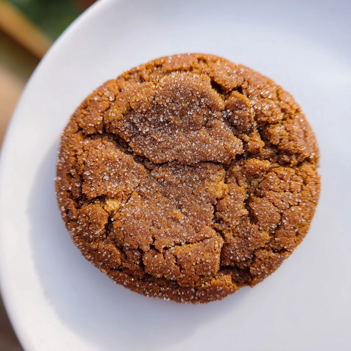 Close-up of golden brown Express Gingerbread Latte Cookies, showcasing cracks and spices, ideal holiday treats.