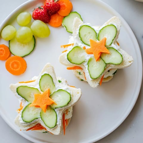 Vibrant image of a Beach Day Starfish Snack Spread, featuring charming sandwiches and healthy, fresh snacks.