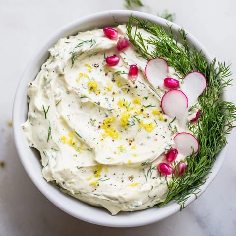 Homemade Reindeer Antler Spread: a close-up shows the creamy spread encircled by crisp, decorative vegetable accents.