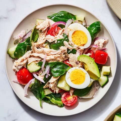 Creamy High-Protein Chicken and Egg Salad with a tangy Dijon mustard dressing, ready to eat!