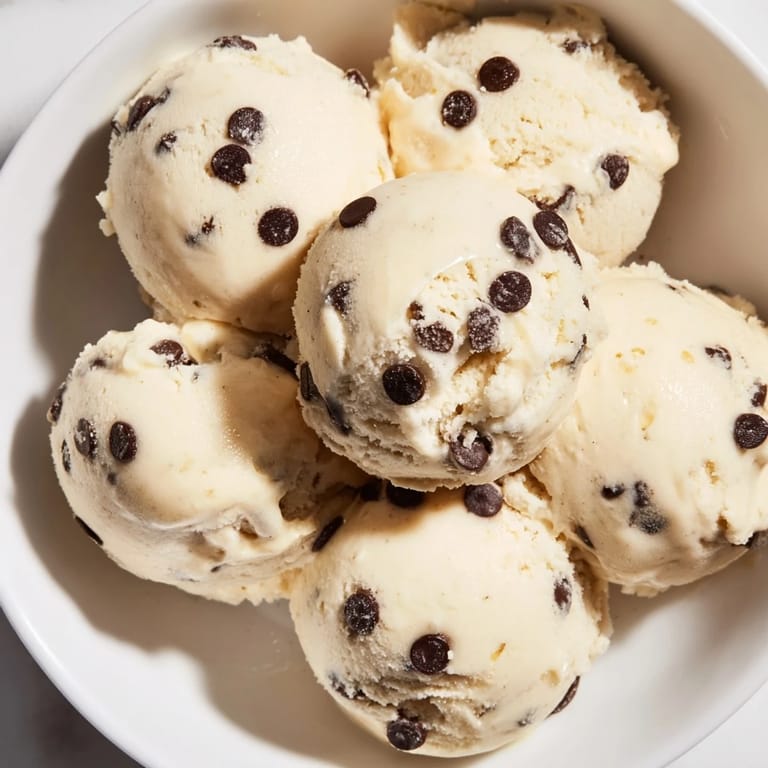 Guilt-free Cottage Cheese Ice Cream with Cookie Dough garnished with extra mini chocolate chips.